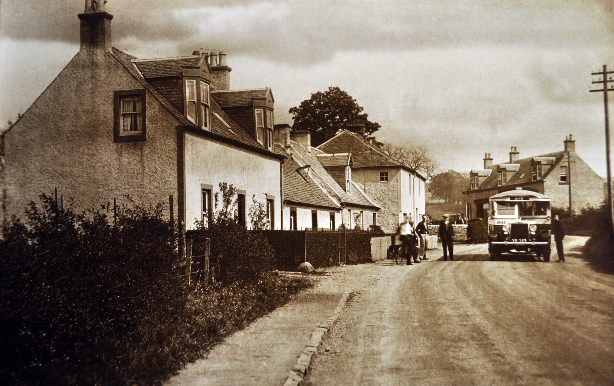 A historic Ayr-bound bus stopped on the road through Priestland